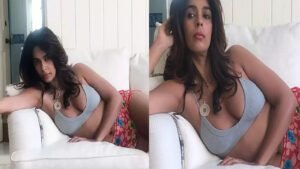 प’त’ली सी ड्रेस पहनकर सो’फे पर लेटी मल्लिका शेरावत, ऊप’र की तरफ देख जागे लोगों के अ’र’मां