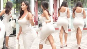 नोरा फतेही ने पहन ली इतने बड़े कट वाली ड्रे’स, भीड़ में लोगों के सामने बार-बार बचाती रहीं इ’ज्ज’त